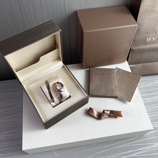 Reloj B brazalete bicolor rosa y plateado