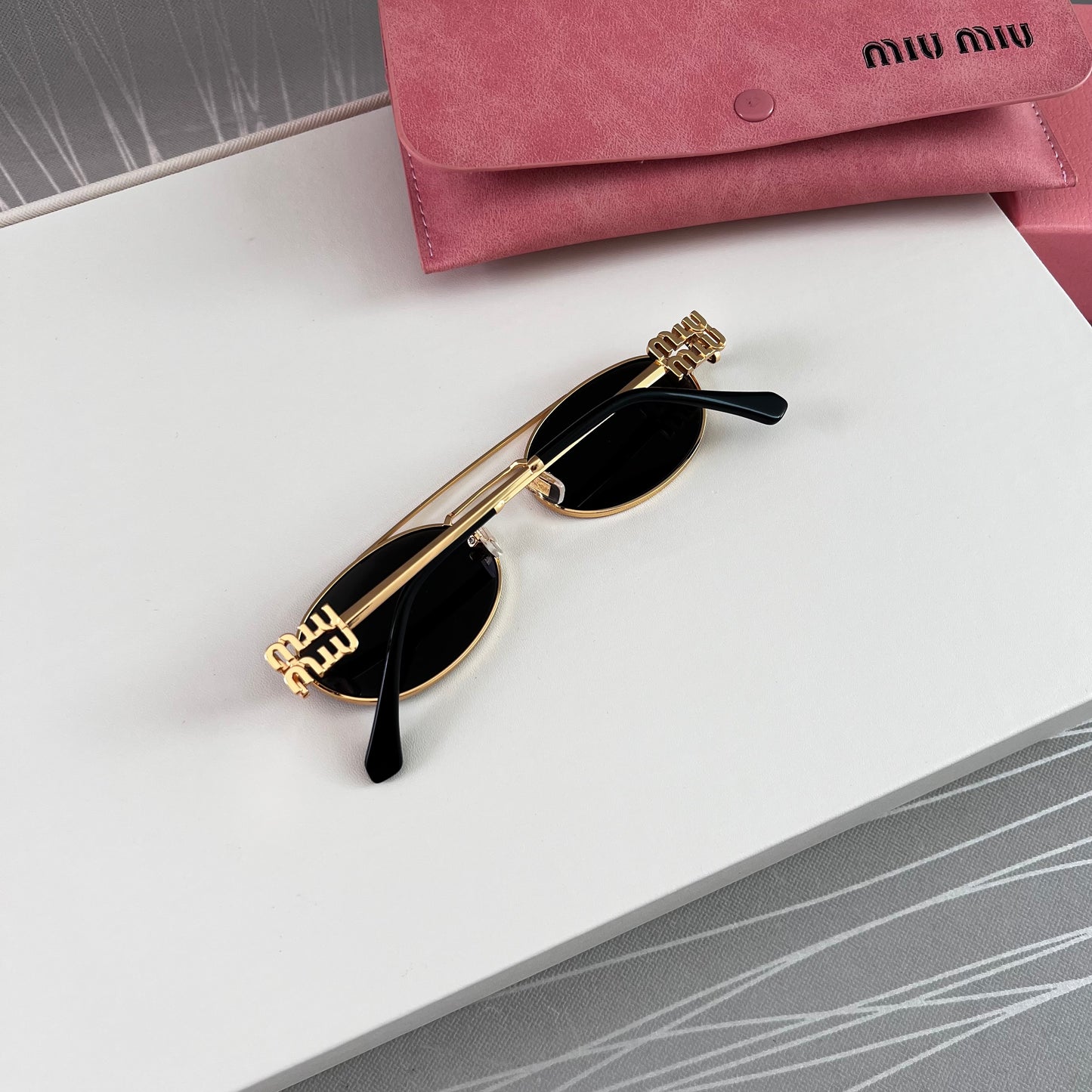 Lentes M negro con dorado