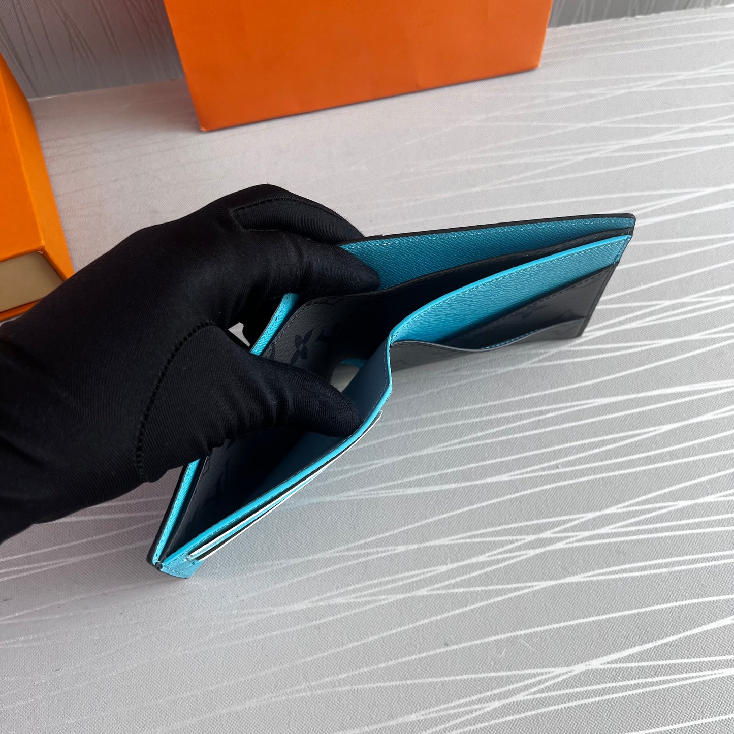 Cartera L lona y piel color gris