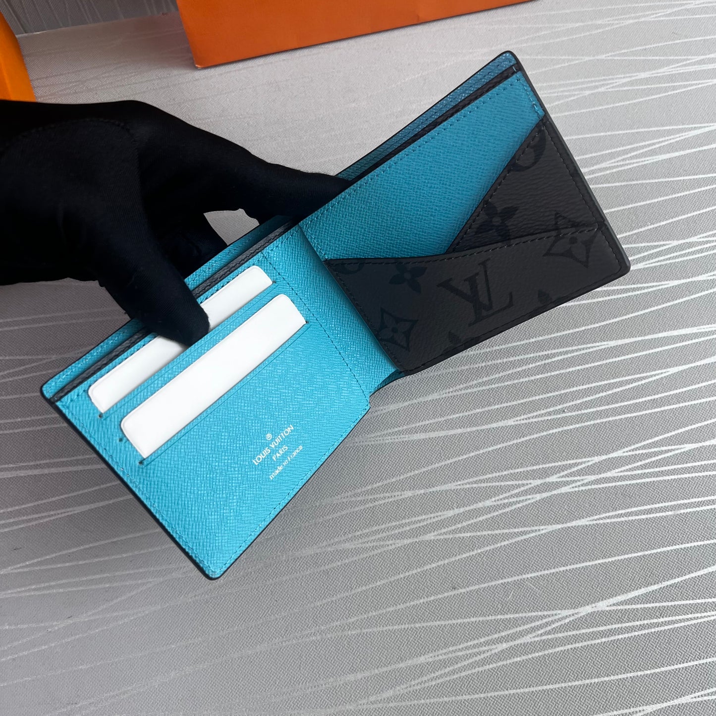 Cartera L lona y piel color gris