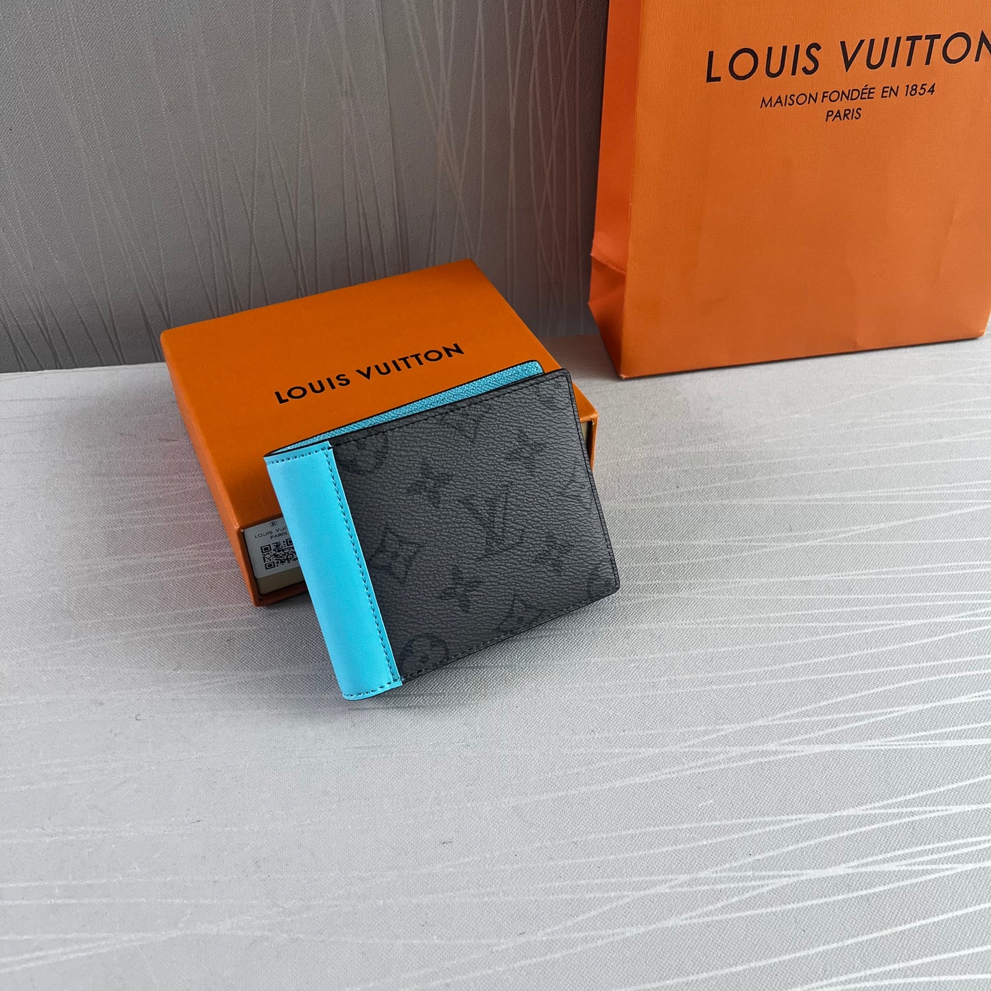 Cartera L lona y piel color gris