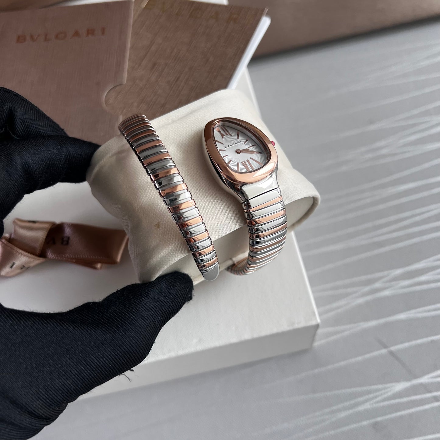 Reloj B brazalete bicolor rosa y plateado