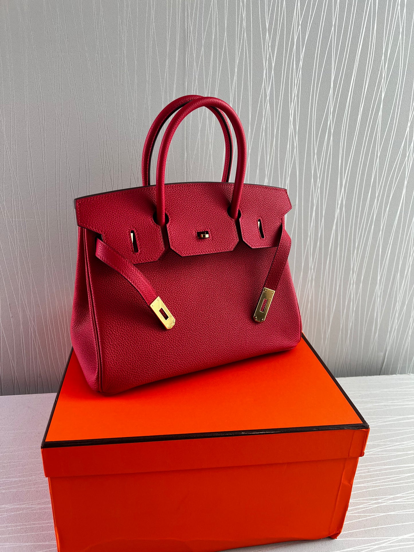Bolso H piel color rojo