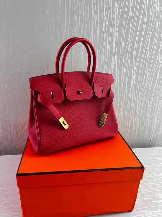 Bolso H piel color rojo