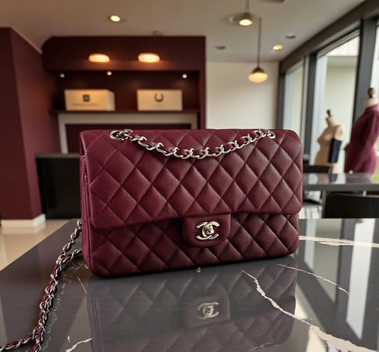 Bolso C-hanel piel caviar color vino, herrajes dorados