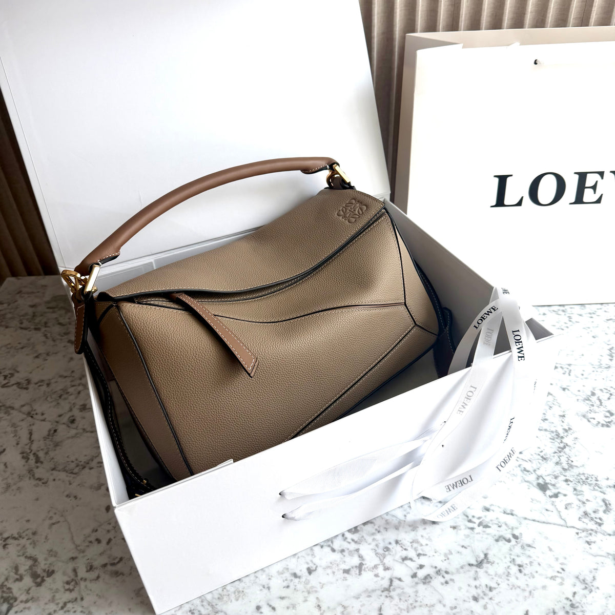 Bolso L-oewe piel color taupe