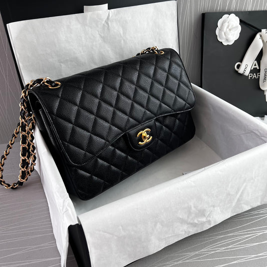 Bolso C-hanel piel caviar color negro con herrajes dorados
