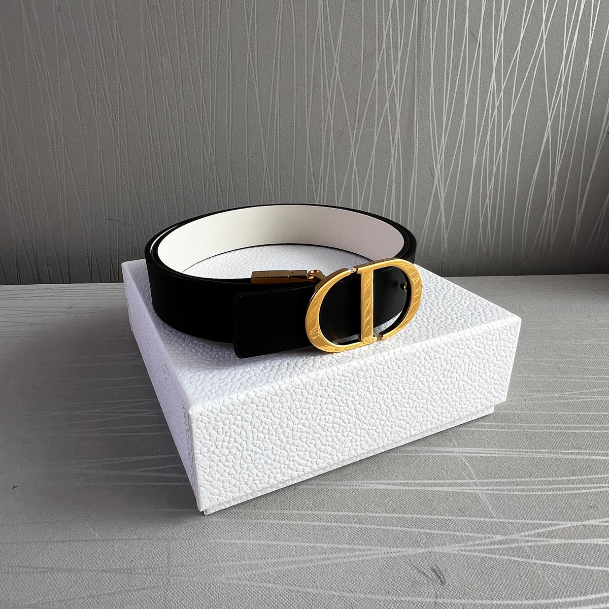 Cinto D-ior piel reversible negro y blanco